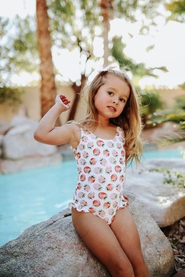 PINK DESERT GIRLS MINI RUFFLE LEG SCOOP ONE PIECE SWIMSUIT IN SUMMER STRAWBERRY