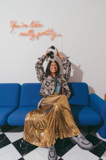 LALA ORIGINAL: Metallic Pleated Midi Skirt in 24 Karat Gold